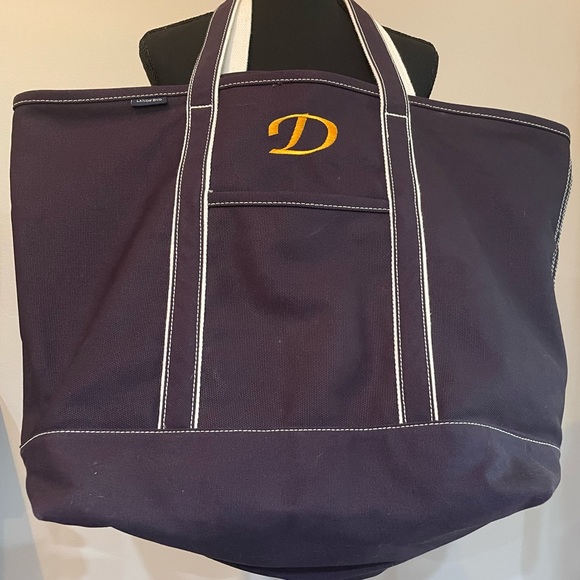 Lands' End Handbags - Lands End large navy bag - lots of pockets and sturdy! Embroidered with gold “D”